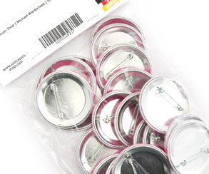 Button badges in poly bag with header card, Luminari Shop